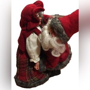 Red and White dancing Santa and Mrs. Claus
